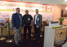 Andre Bailey, Greg Evans and Richard Isaacs from Global Fruit, they invested in a nice plant at their desk on the right.